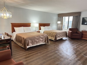 Suite, Non Smoking (1 King Bed, 2 Queen Beds) | Down duvets, blackout curtains, iron/ironing board, free WiFi