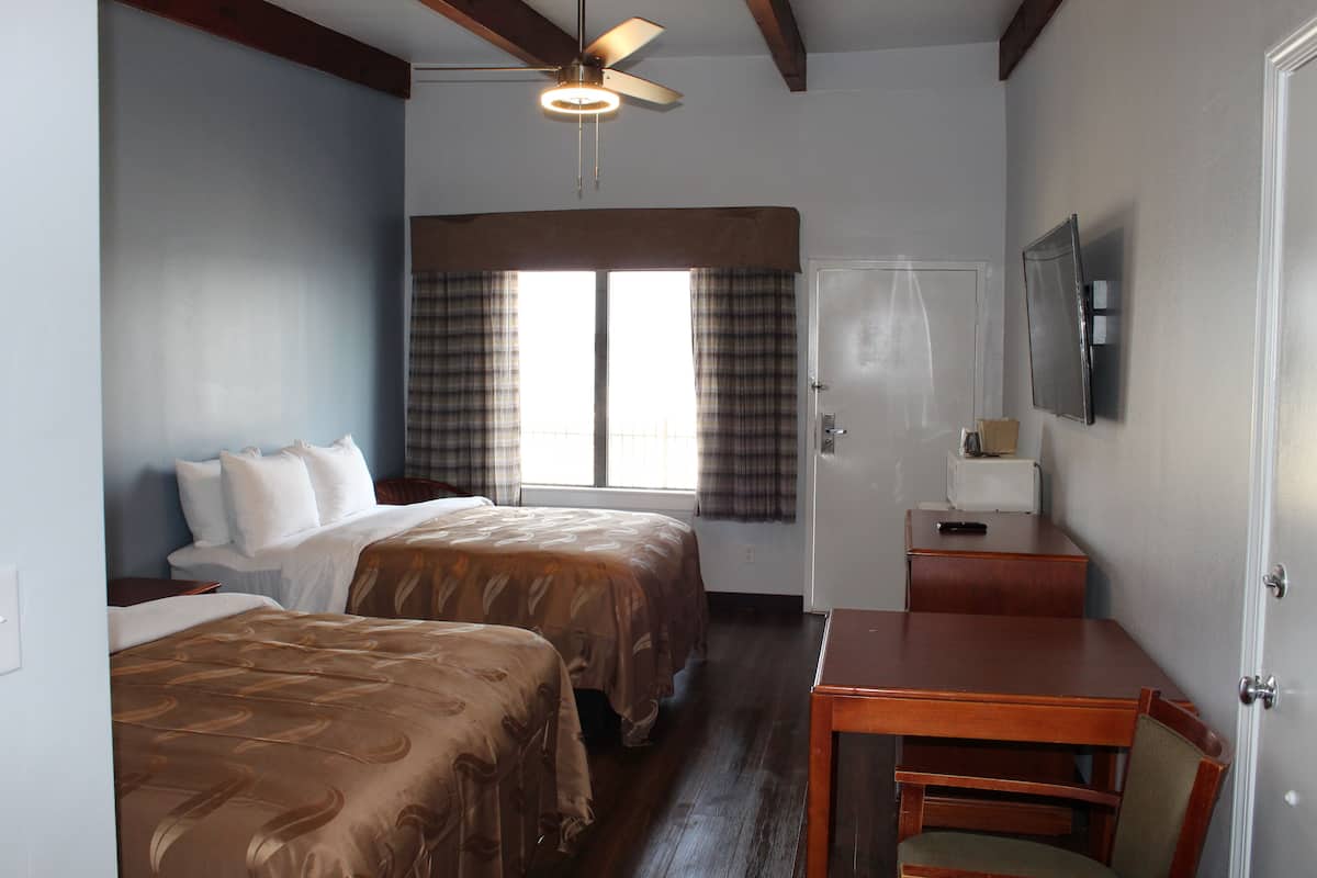 Down comforters, blackout drapes, iron/ironing board, free WiFi