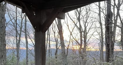 A Unique Bed and Breakfast...Log Cabins, with Hot Tubs and Breakfast Delivered Each Morning :)