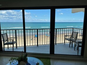 A balcony with a view of the beach and ocean. - Gorgeous Oceanfront Condo, heated pool, garage (South Padre Island)