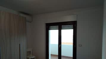 2 bedrooms, desk, iron/ironing board, travel cot