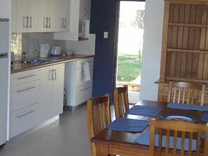 Dining - Seychelles Ground Level 2 Bedroom air-con self-contained apartment,  River views (Wooli)