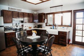 Microwave, dishwasher, coffee/tea maker, cookware/dishes/utensils