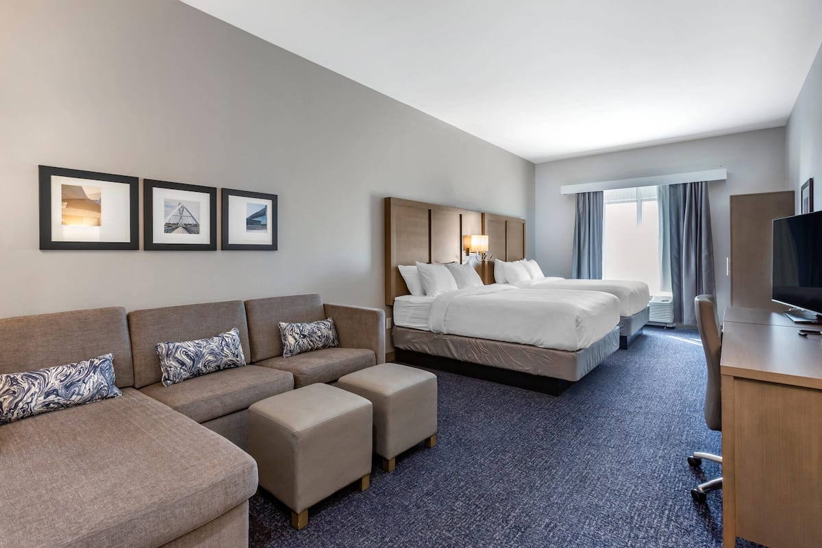 Premium bedding, pillow-top beds, desk, laptop workspace
