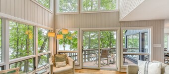 Dreamy lakefront gem on wooded property with private beach, dock & fast WiFi