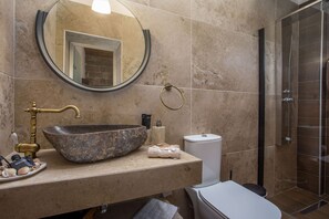 Bathtub, bidet, towels, soap