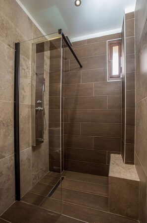 Bathtub, bidet, towels, soap