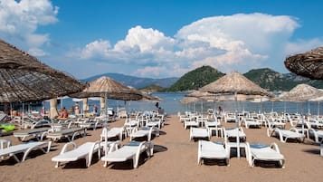 Private beach nearby, beach shuttle, beach bar