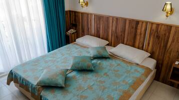 Kamar Double atau Twin Standar | Minibar, brankas, Wi-Fi gratis, dan seprai linen