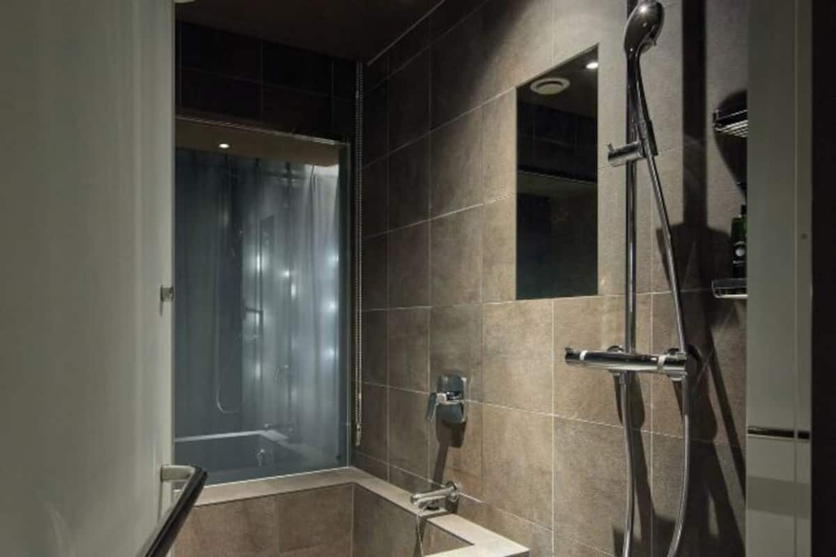 Hair dryer, slippers, bidet, towels