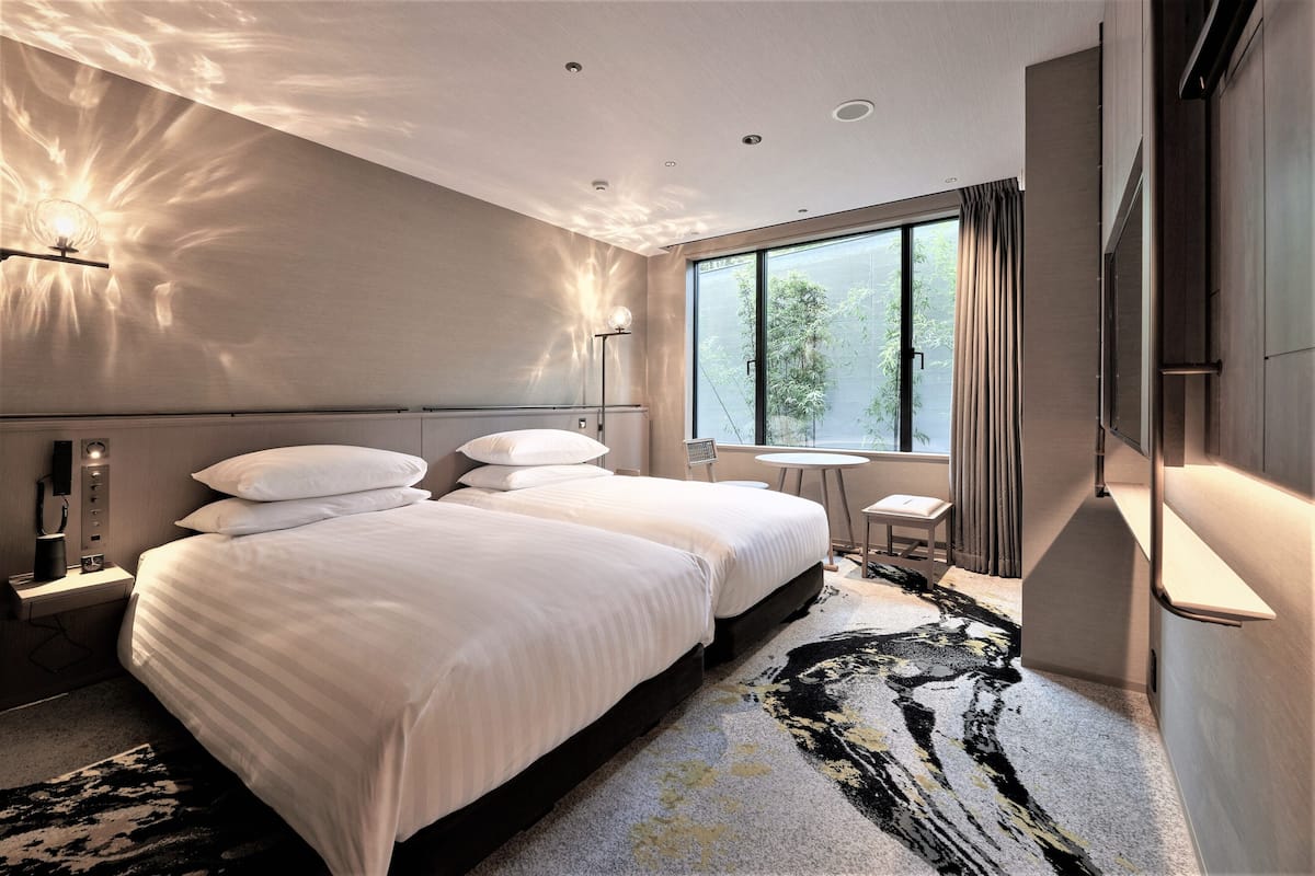 Habitación Deluxe con 2 camas individuales, para no fumadores (Accessible) | Caja de seguridad en la habitación, cunas gratuitas y wifi gratis