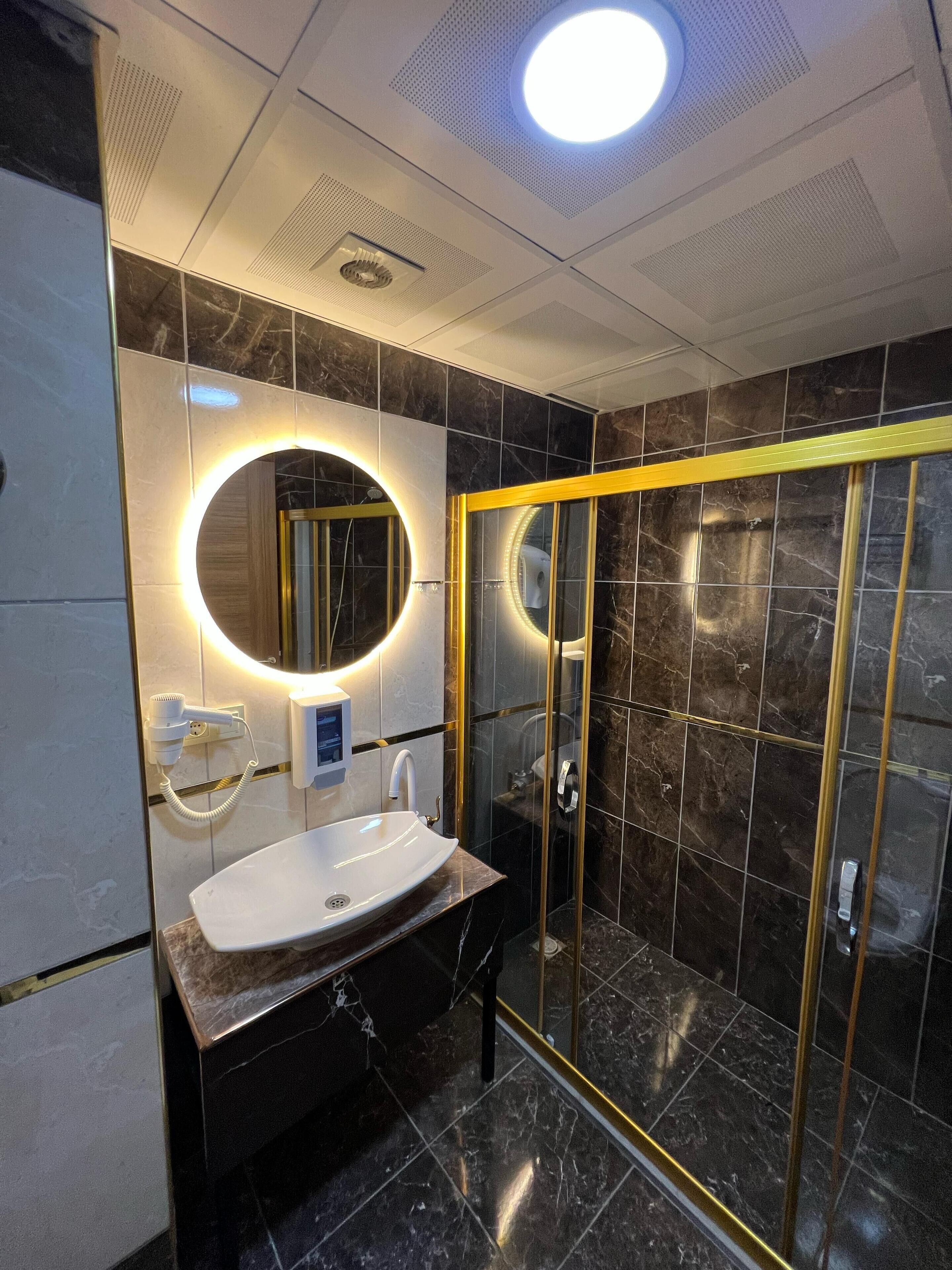 shower, free toiletries, hair dryer, slippers