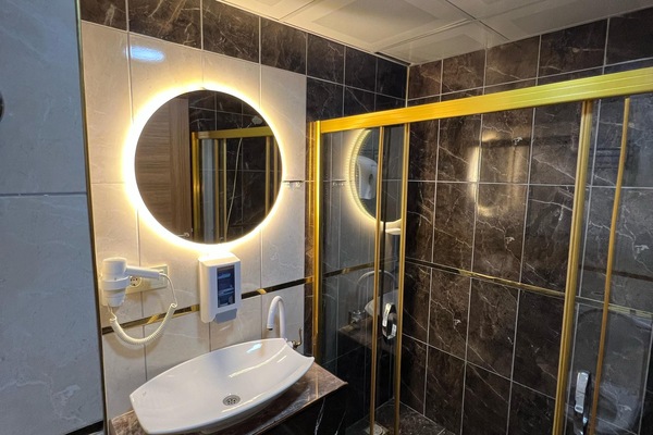 Shower, free toiletries, hair dryer, slippers