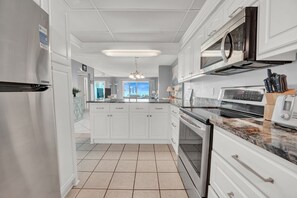 Fridge, microwave, oven, stovetop - 1 Bd/Ba Deluxe Gulf Front,  Steps to Beach; Pool! Sleeps 4!  First Floor Condo (PCB)