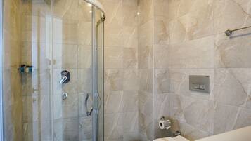 Standard Room | Bathroom | Shower, hair dryer, slippers, towels