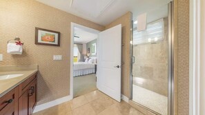 Shower, hair dryer, towels, shampoo