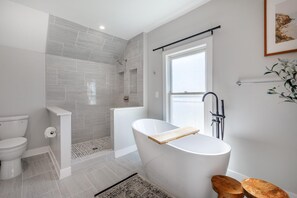 Bathtub, hair dryer, towels