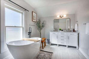 Bathtub, hair dryer, towels