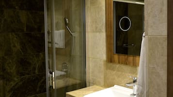 Shower, free toiletries, hair dryer, slippers
