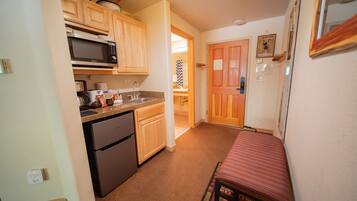 Microwave, coffee/tea maker, toaster, cookware/dishes/utensils