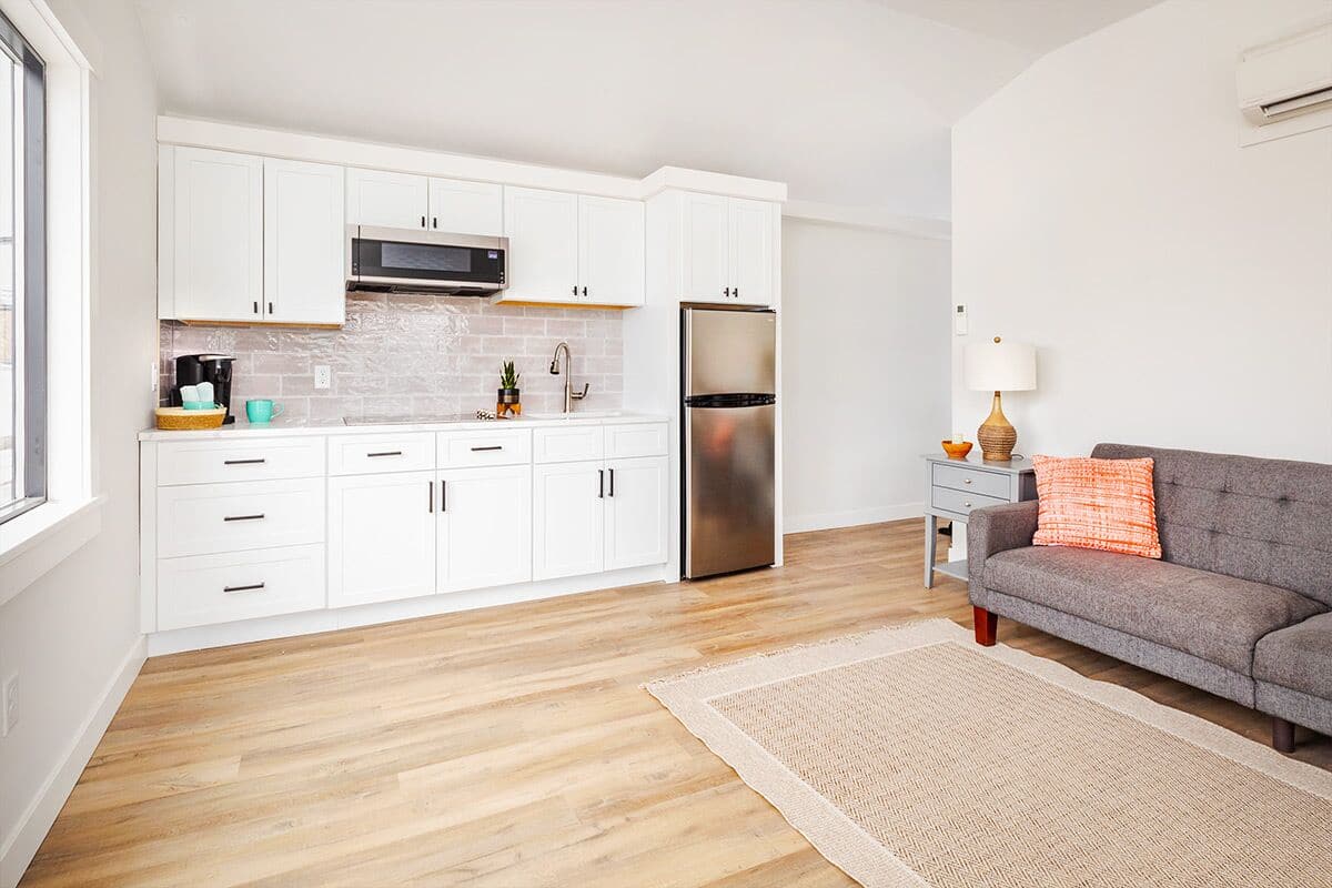 Suite, Pool View | Living area | 55-inch Smart TV with cable channels