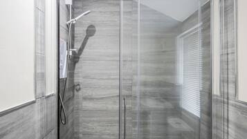 Studio, 2 Single Beds | Bathroom | Separate bathtub and shower, deep-soaking bathtub, hair dryer, towels