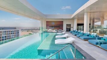 2 outdoor pools, open 8:00 AM to 11:00 PM, pool umbrellas, pool loungers