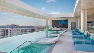2 outdoor pools, open 8:00 AM to 11:00 PM, pool umbrellas, pool loungers
