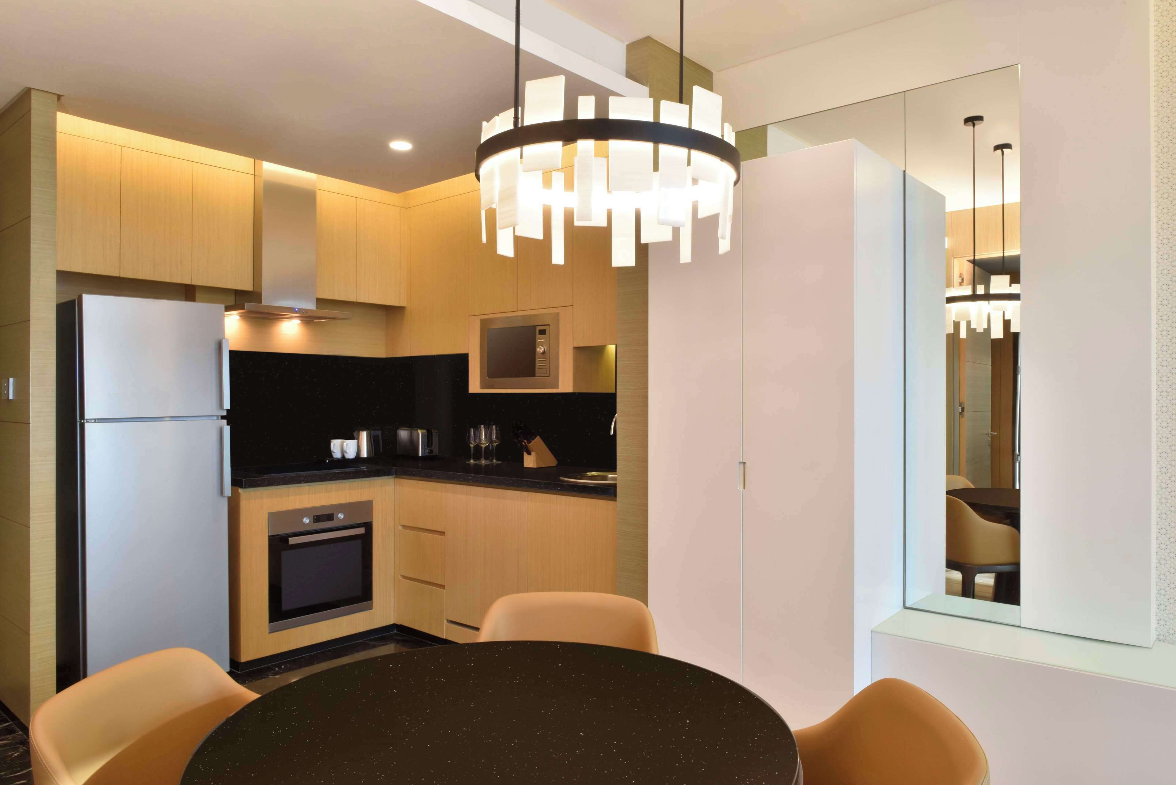 Executive Apartment, 1 Bedroom | Private kitchen | Coffee/tea maker, electric kettle