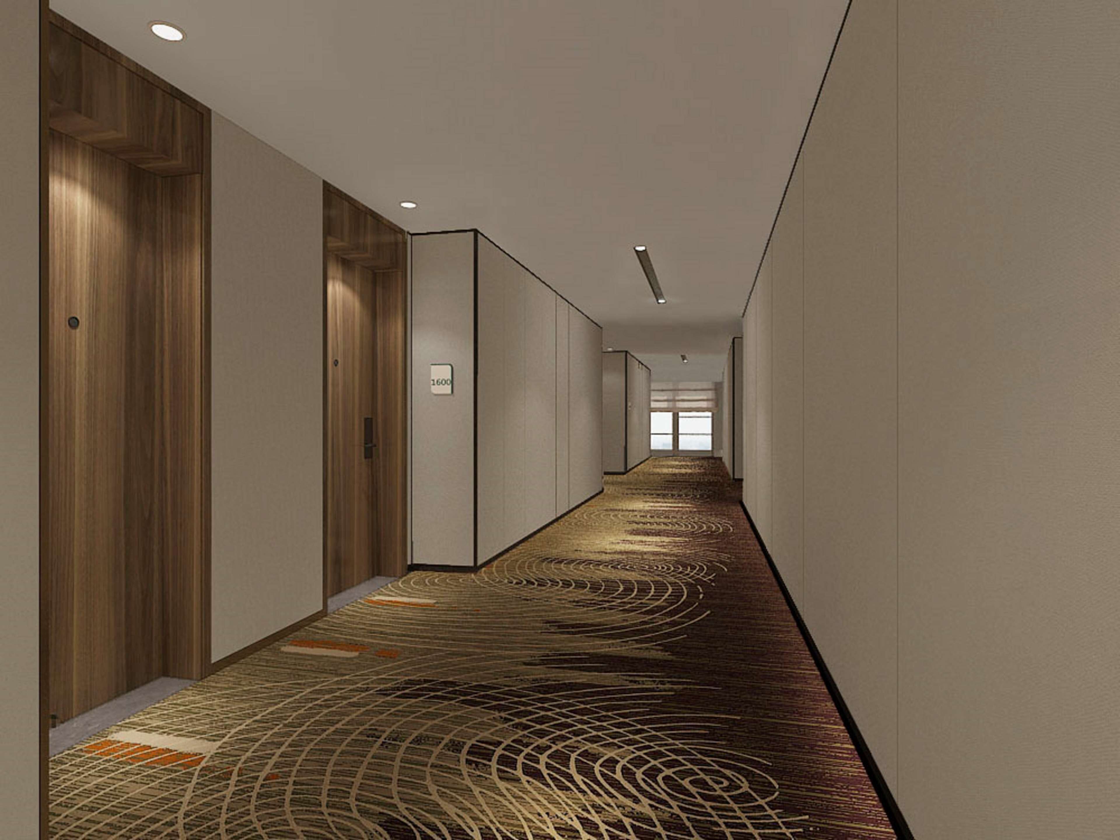 A long, narrow hotel corridor with wooden doors on one side, a carpeted floor, and a view of a window at the end.
