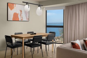 Suite, 1 Bedroom (Rok Suite) | Living area | 50-inch LED TV with cable channels - ROK Hotel Kingston, Tapestry Collection by Hilton (Kingston)