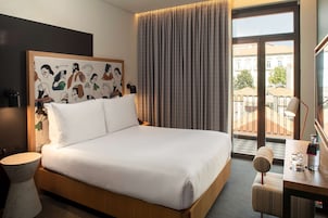 Premium bedding, down comforters, minibar, in-room safe