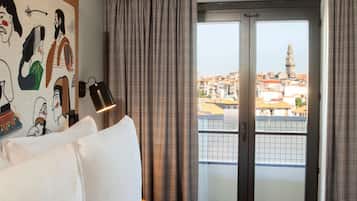 Premium bedding, down duvets, minibar, in-room safe