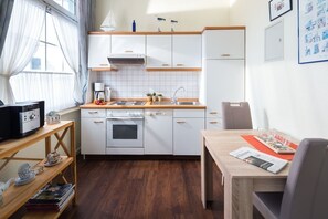Fridge, coffee/tea maker, toaster