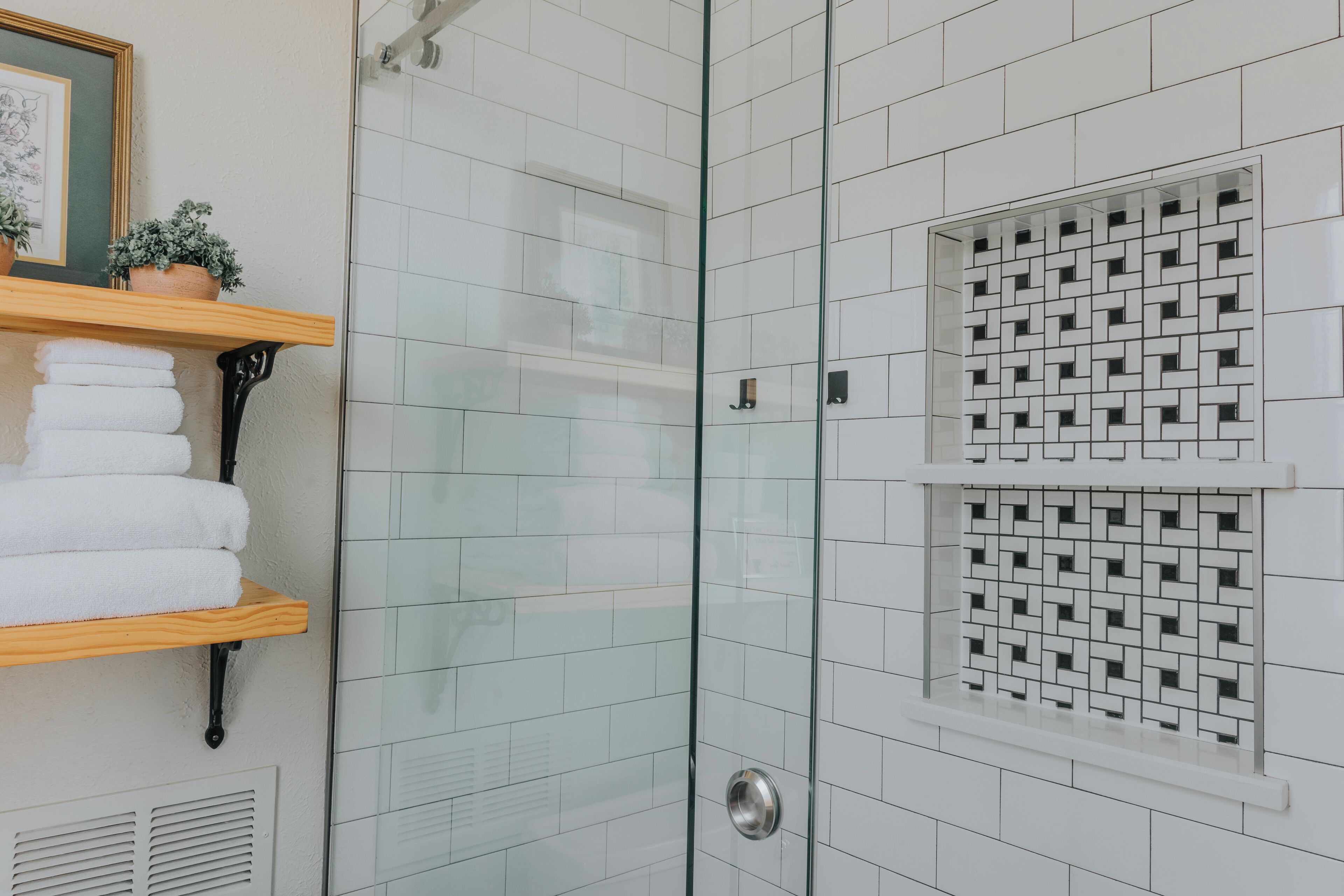 Combined shower/tub, hair dryer, towels, soap