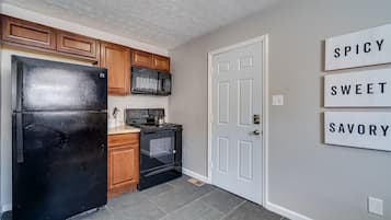 Fridge, microwave, stovetop, coffee/tea maker
