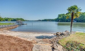 Enjoy serene lakeside views and access to the water from this peaceful retreat.