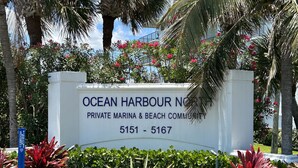 A sign for Ocean Harbour No. 1 Private Marina & Beach Community with contact numbers 5151-5167.