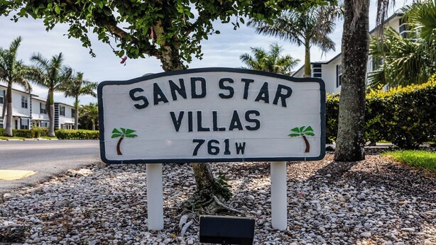A sign for 'Sand Star Villas' with a street address of 761W. - Lovely 2 bedroom 2.5 bath condo (Marco Island)