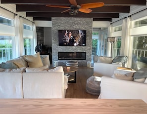 Smart TV, fireplace, books