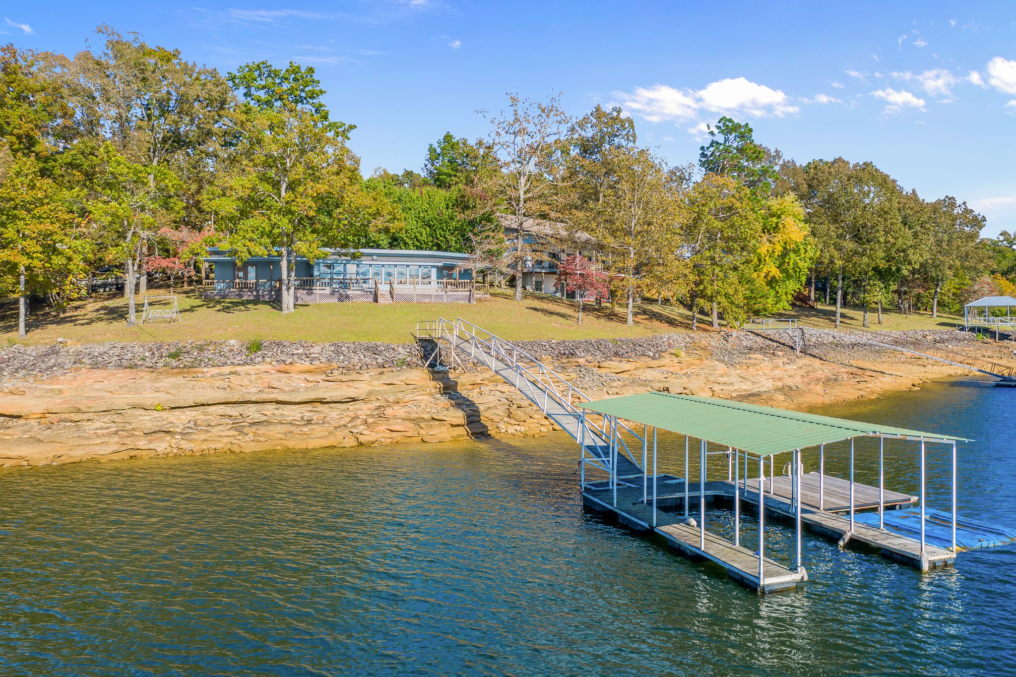 "WATER'S EDGE" - Main Channel views, flat lot, boat slip and PWC port!