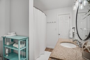 Combined shower/bathtub, hair dryer, towels, soap