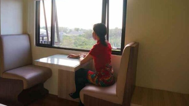 A room with a window, a desk, and a chair. - Bukit Indah Lestari Hotel (Tanjung Baru)