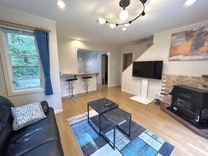 Casa família, para não fumantes | Área de estar | TV de tela plana