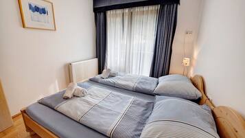 2 quartos, Wi-Fi de cortesia, roupa de cama