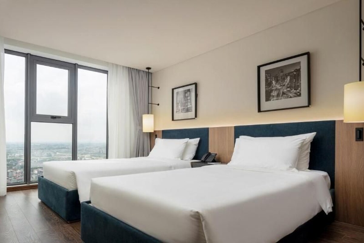 Sengetøy av topp kvalitet, memory foam-senger, minibar og safe på rommet