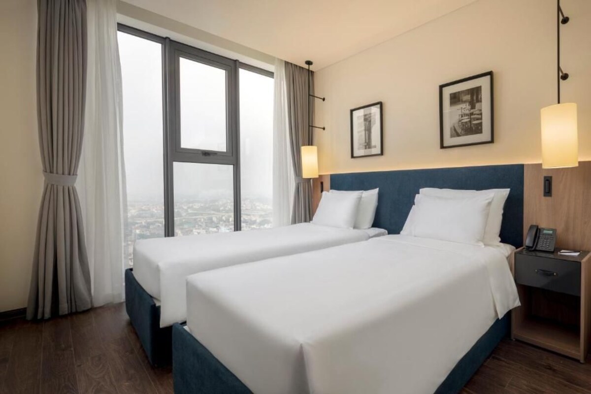 Sengetøy av topp kvalitet, memory foam-senger, minibar og safe på rommet