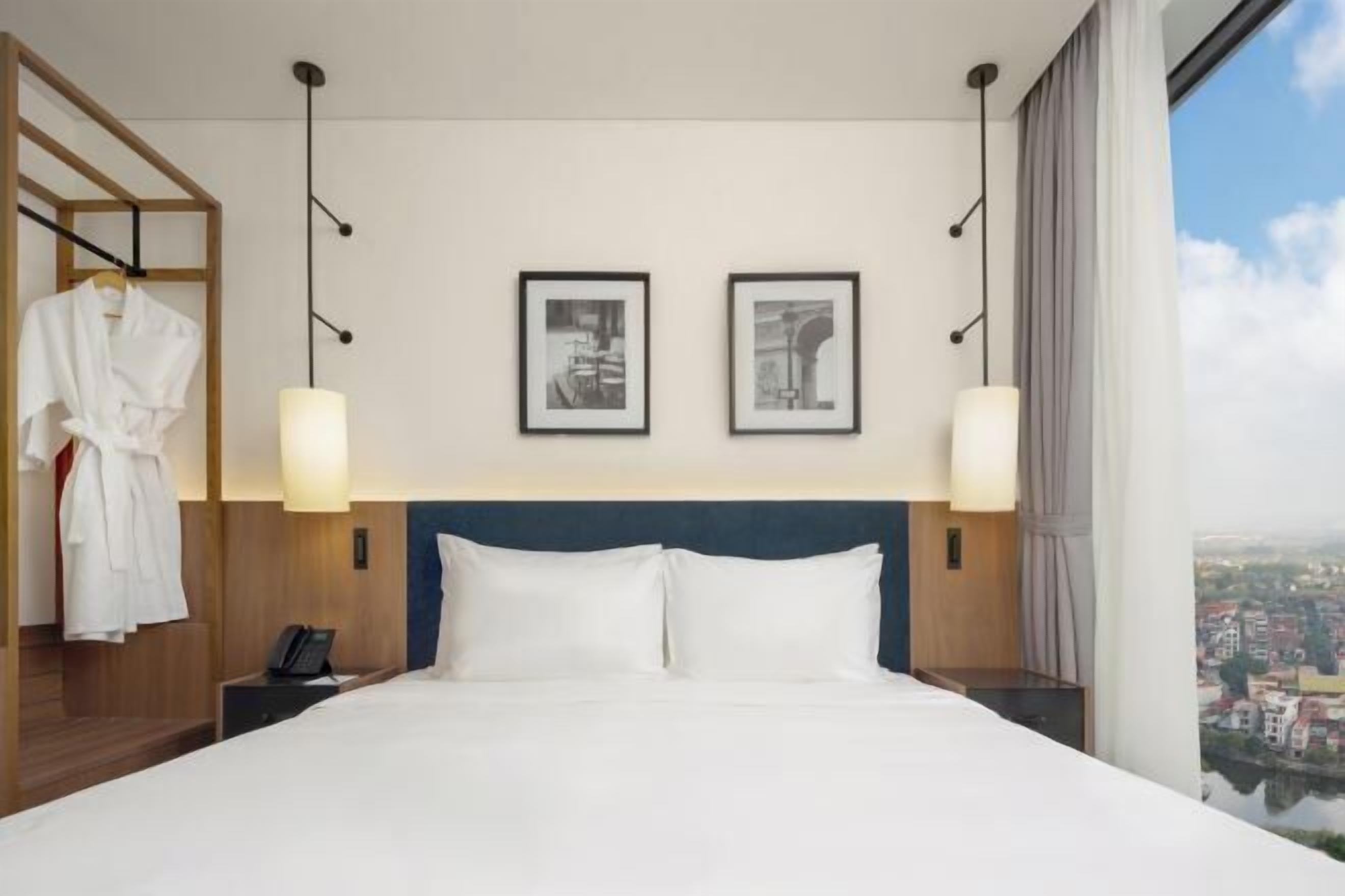 Sengetøy av topp kvalitet, memory foam-senger, minibar og safe på rommet