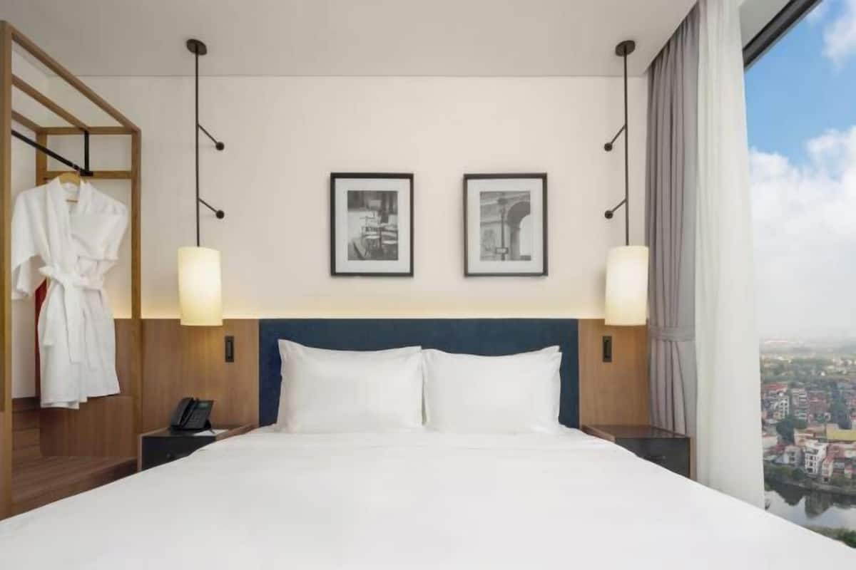 Sengetøy av topp kvalitet, memory foam-senger, minibar og safe på rommet