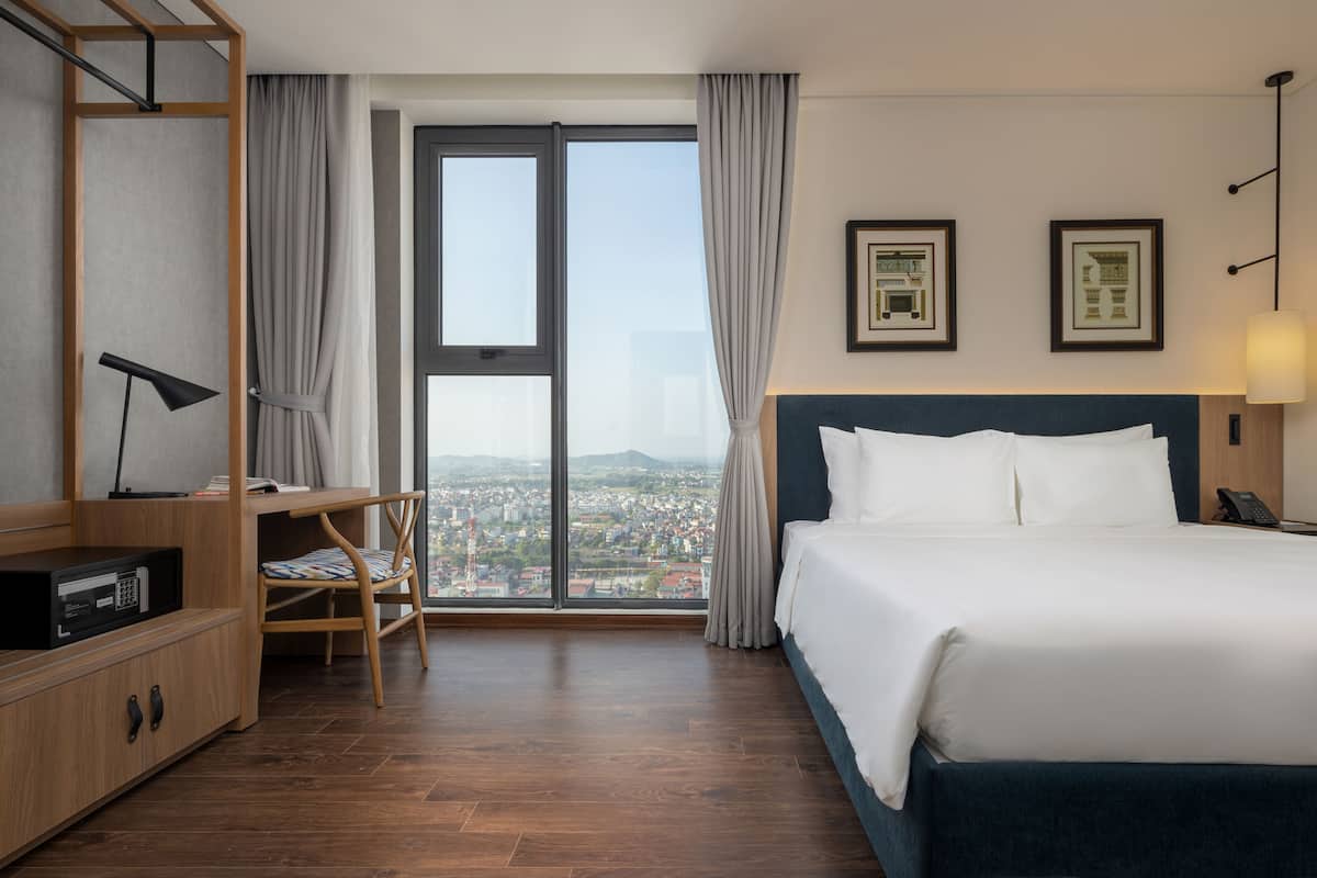 Appartement, 2 slaapkamers (4pax) | 1 slaapkamer, luxe beddengoed, bedden met traagschuimmatras, een minibar